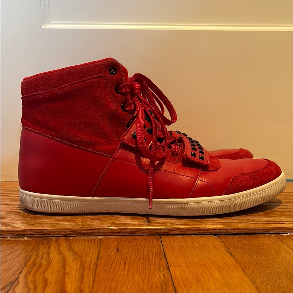 Reebok Dibello mid stud sneakers in red and black
